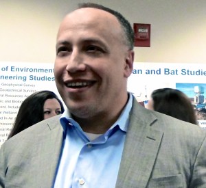 Jeff Grybowski, CEO Deepwater Wind celebrates with colleagues and supporters after CRMC approval of BIWF in May 2014. (Photo Tracey C. O'Neill)