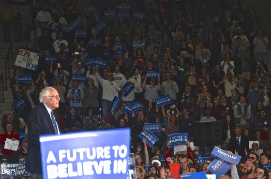 Democratic Presidential Candidate U.S. Sen. Bernie Sanders pauses as a crowd of supporters at UMASS Amherst cheer. (Photo Tracey C. O'Neill)
